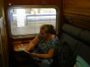 Kerry reading the information leaflet, in our cabin of the Indian Pacific, East Perth railway station 