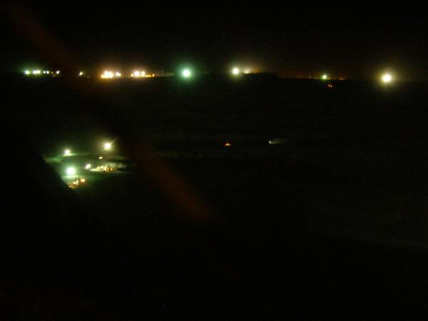 The Super Pit at night,  | the lights are from the trucks etc,  | it is 24x7 operation,  | Kalgoorie, Western Australia  | 